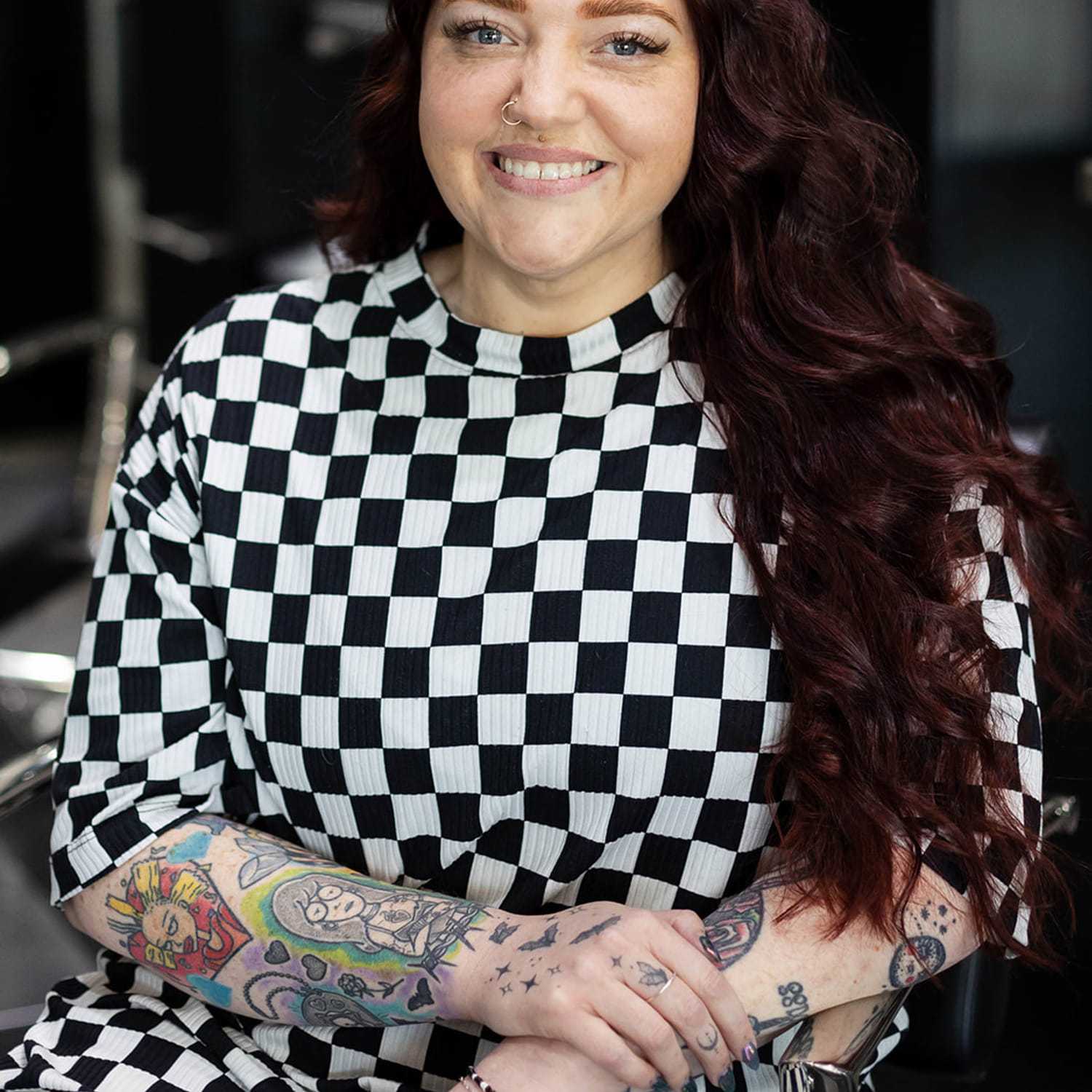 Portrait of Kayla Abrams, a professional stylist at Salon361, showcasing their expertise and style.