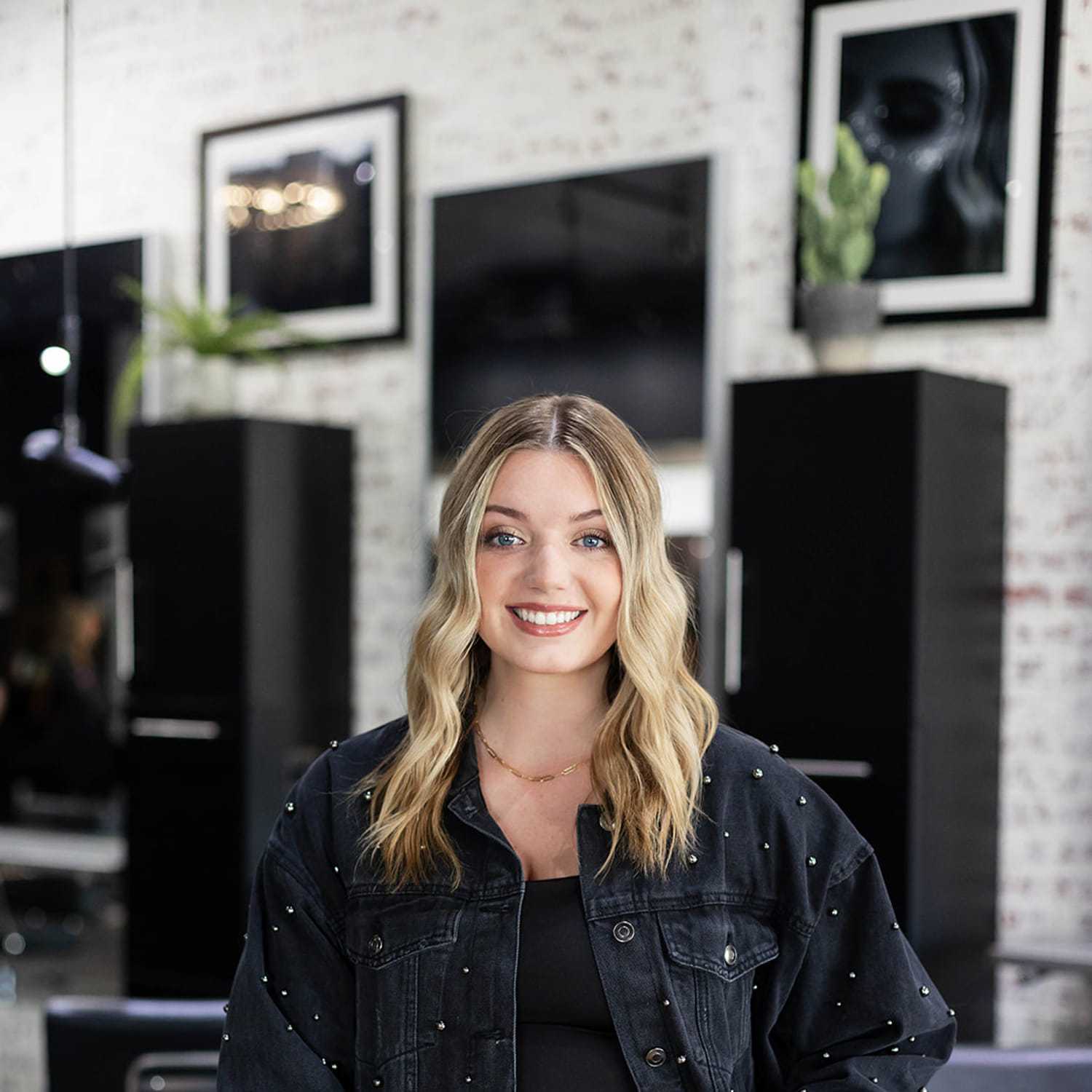 Portrait of Madison Pruitt, a professional stylist at Salon361, showcasing their expertise and style.